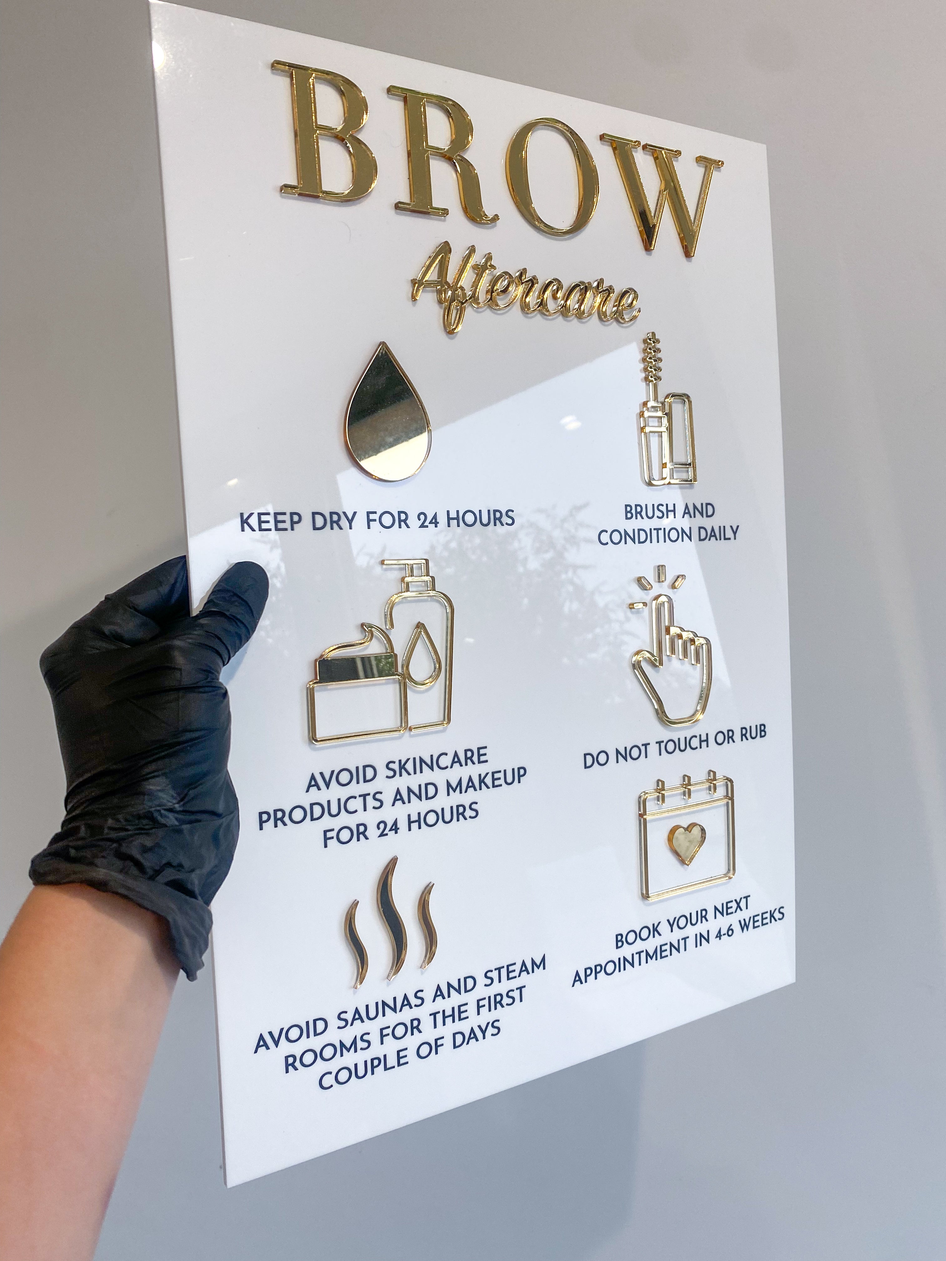 Brow aftercare acrylic sign in white and gold
